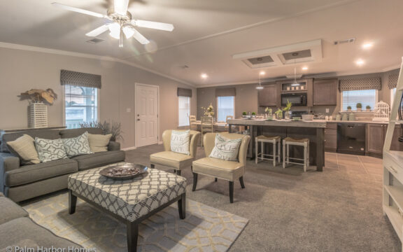 Living room with kitchen and dining area in the background - Siesta Key II P2566Q by Palm Harbor Homes
